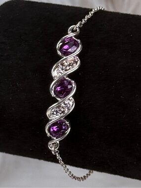 Beautiful Silvertone, purole and clear bling adjustable bracelet
